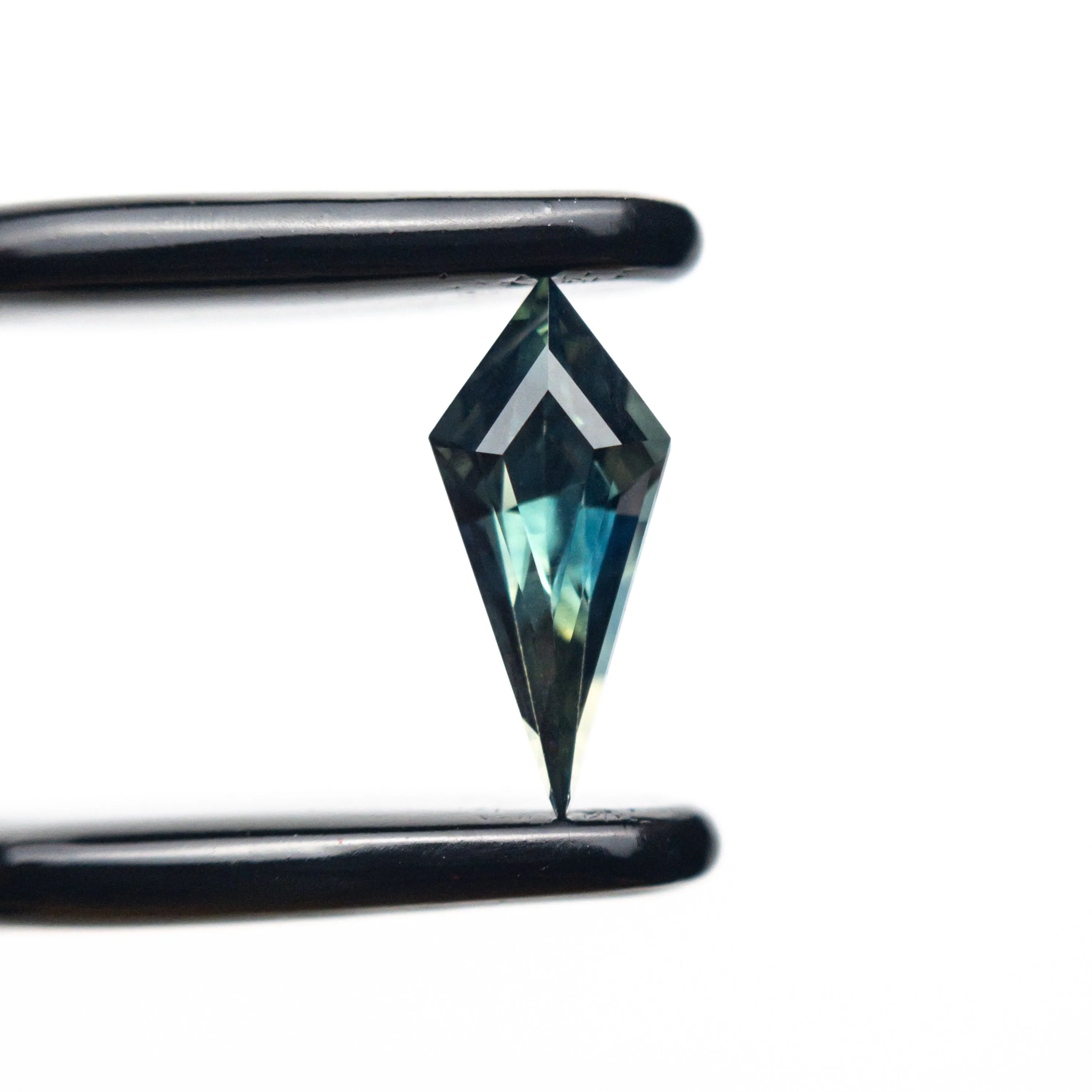 0.54ct 9.13x3.97x3.24mm Kite Step Cut Sapphire 25197-01