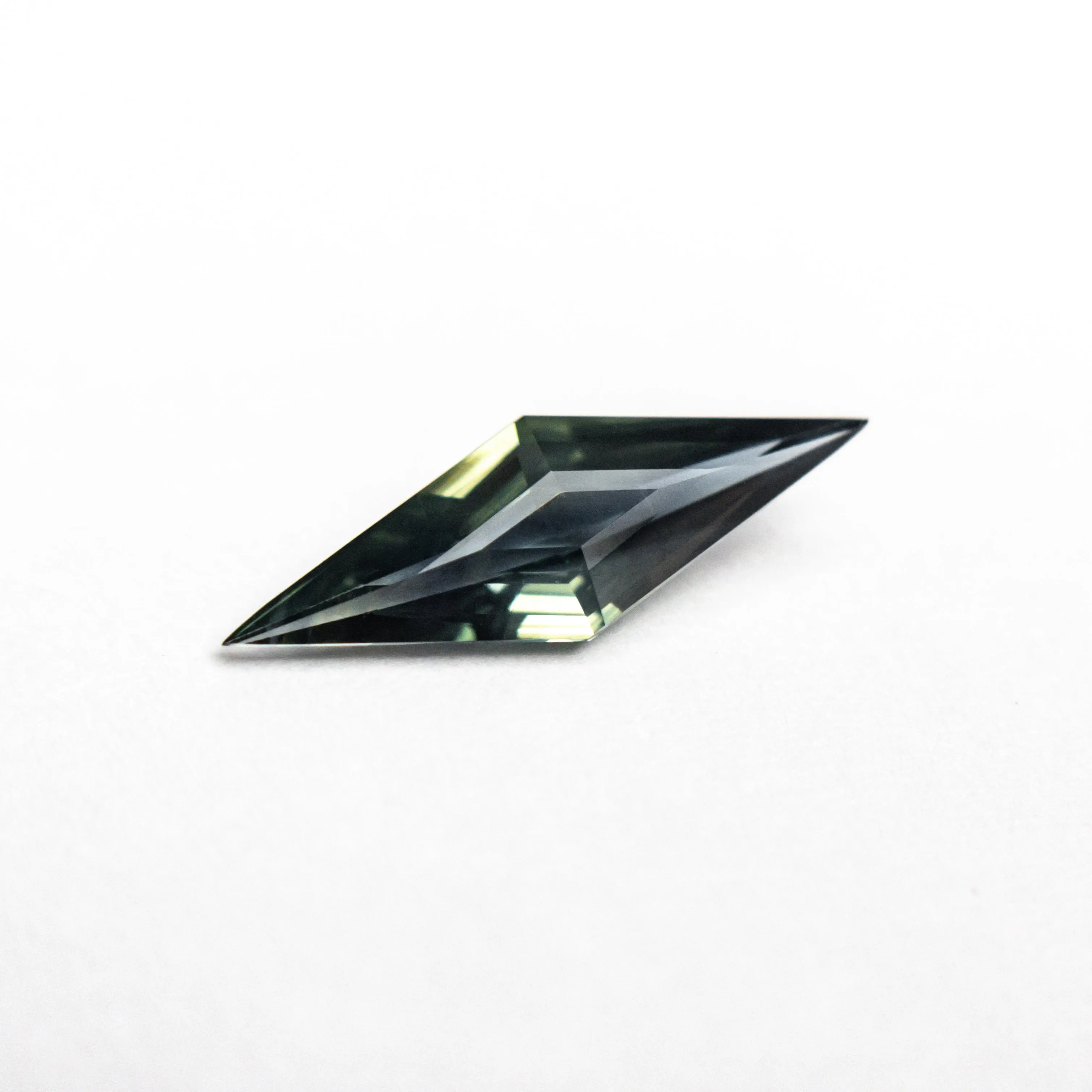 0.55ct 11.81x3.99x2.27mm Lozenge Step Cut Sapphire 25196-09