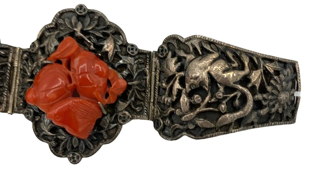 1920s Chinese Silver Repousse Bracelet with Deep Carved Coral Figuratives