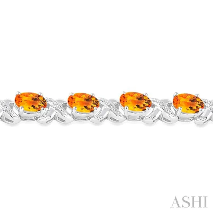 7x5 mm Oval Cut Citrine and 1/20 Ctw Round Cut Diamond Fashion Bracelet in Sterling Silver