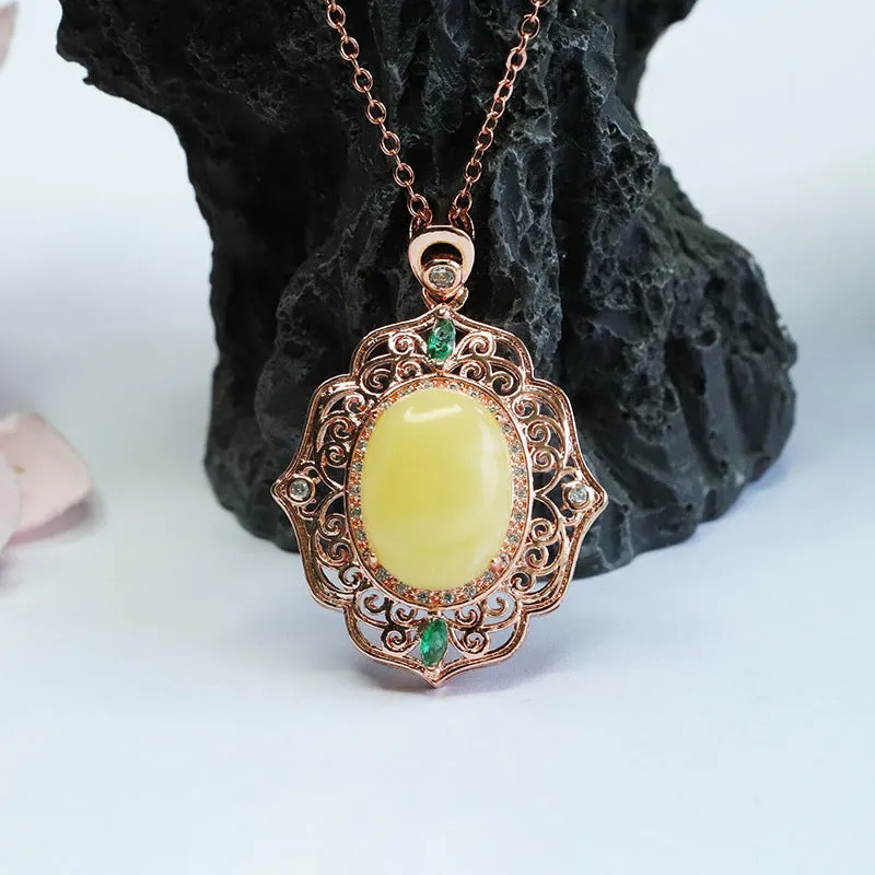 Amber Beeswax Pendant Necklace with Rose Gold Accents and Ethnic Influence