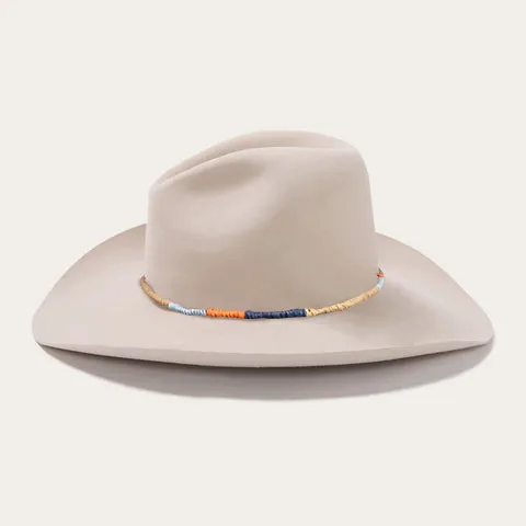 Classic White Cowboy Hat with Wide Crown and Downturned Brim