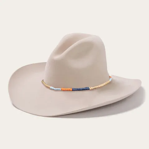 Classic White Cowboy Hat with Wide Crown and Downturned Brim