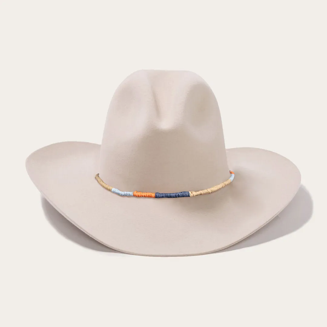 Classic White Cowboy Hat with Wide Crown and Downturned Brim