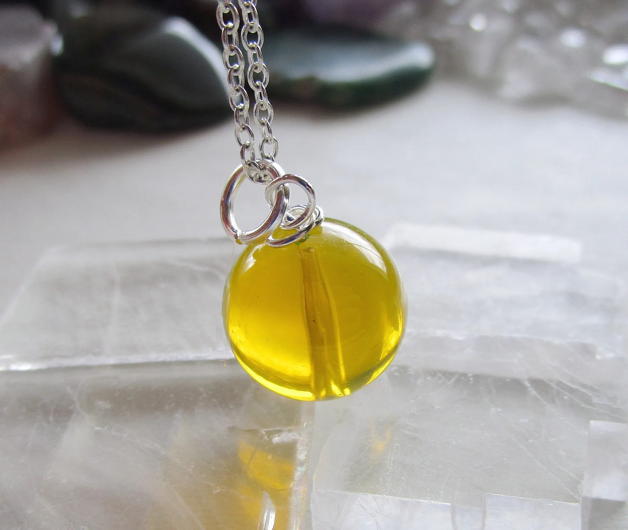 Dominican Blue Amber Bead Sphere Pendant Necklace