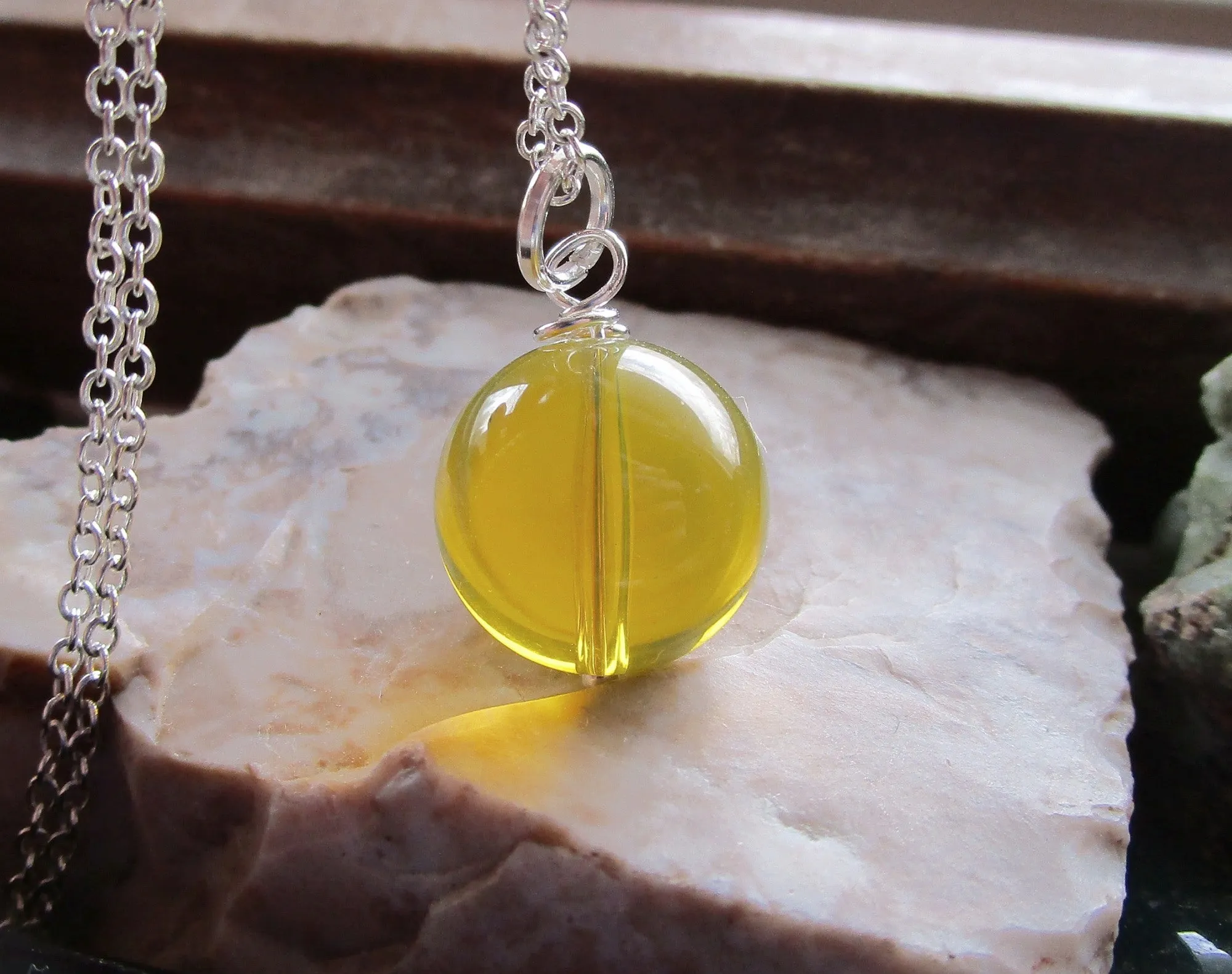 Dominican Blue Amber Bead Sphere Pendant Necklace