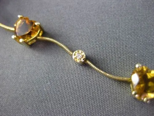 ESTATE LONG 3.85CTW DIAMOND & AAA CITRINE 14KT YELLOW GOLD HEART LOVE BRACELET