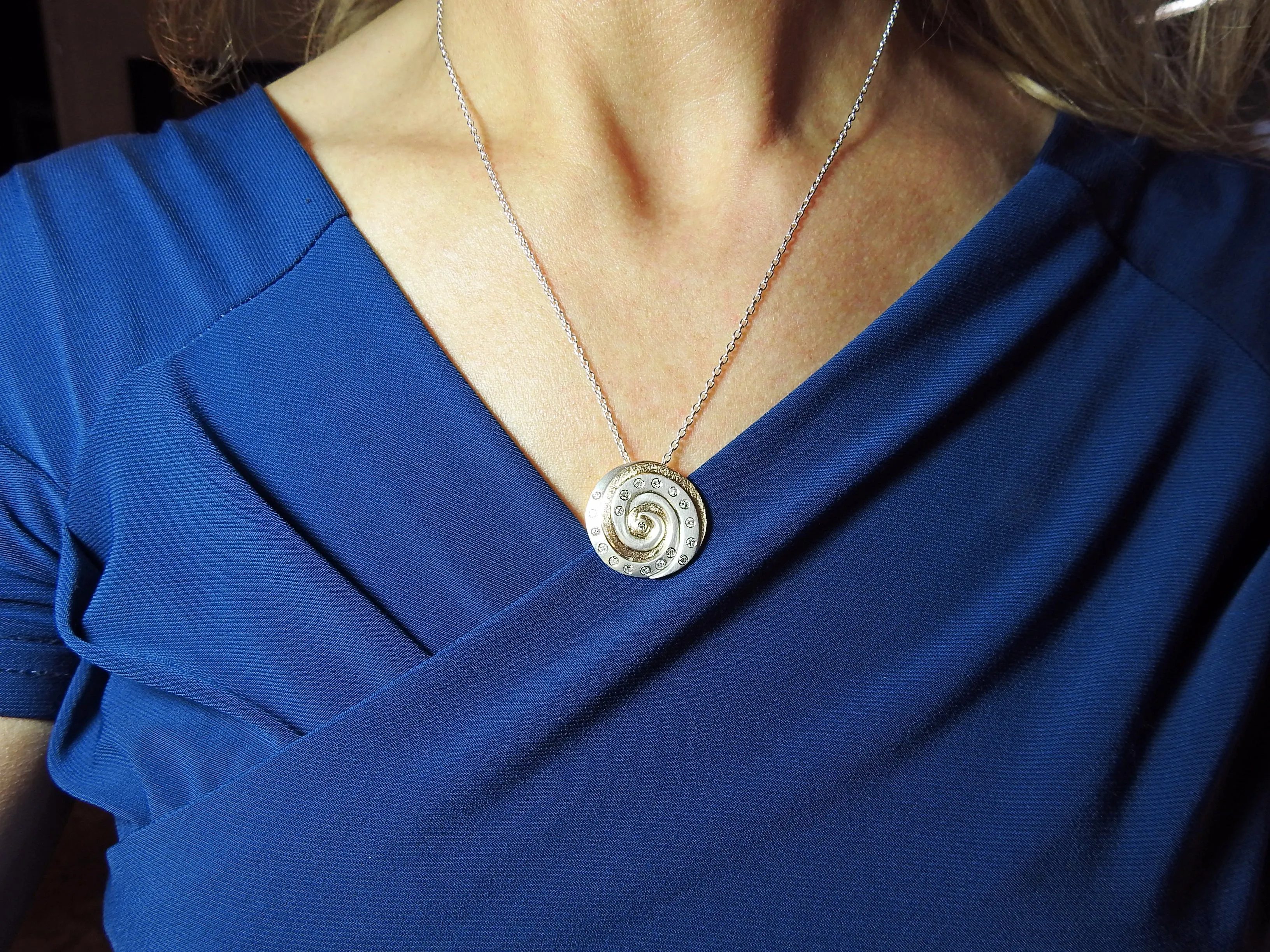 Koru Symbol inspired pendant