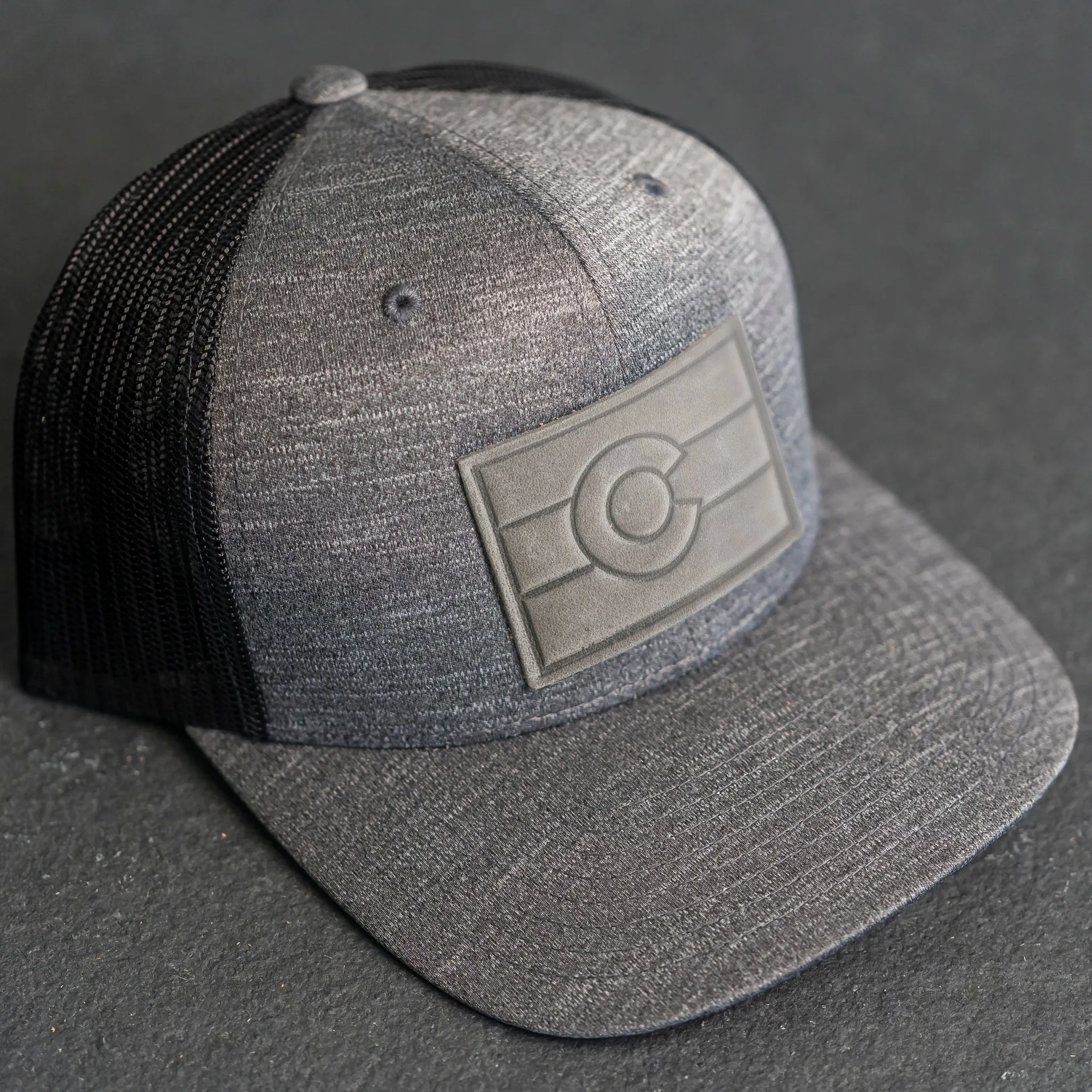 Leather Patch Performance Style Trucker Hat - Colorado Flag Stamp