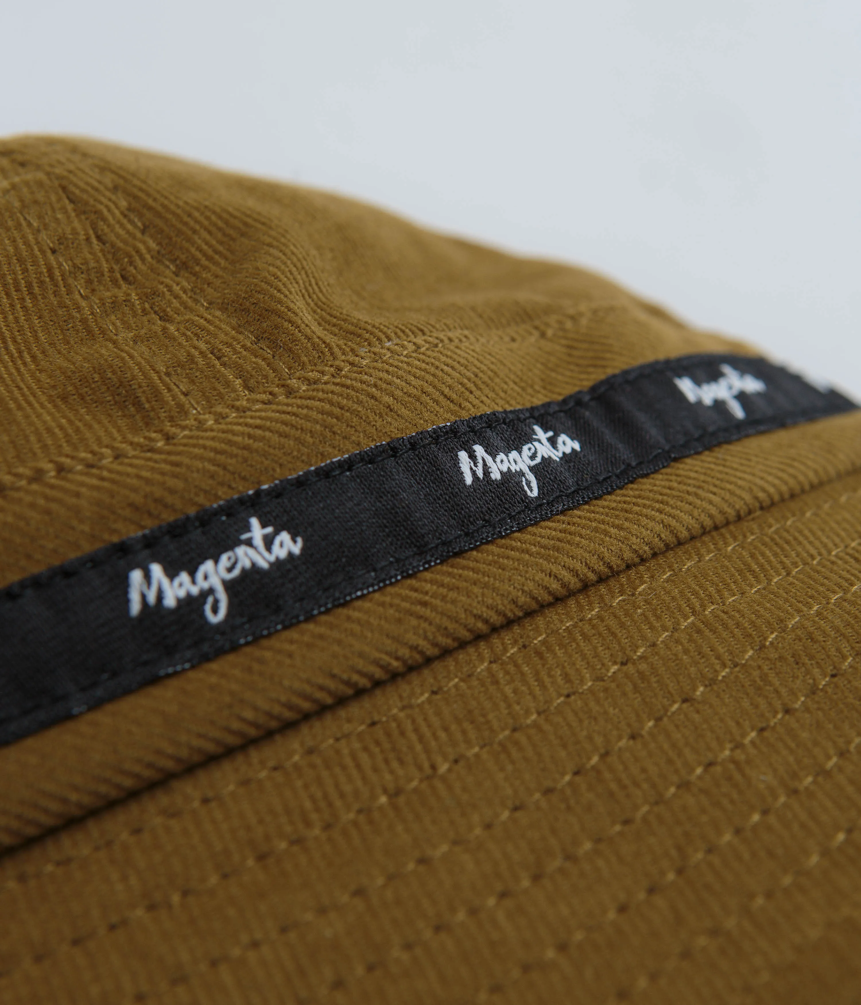 Magenta Script Cord Bucket Hat - Brown