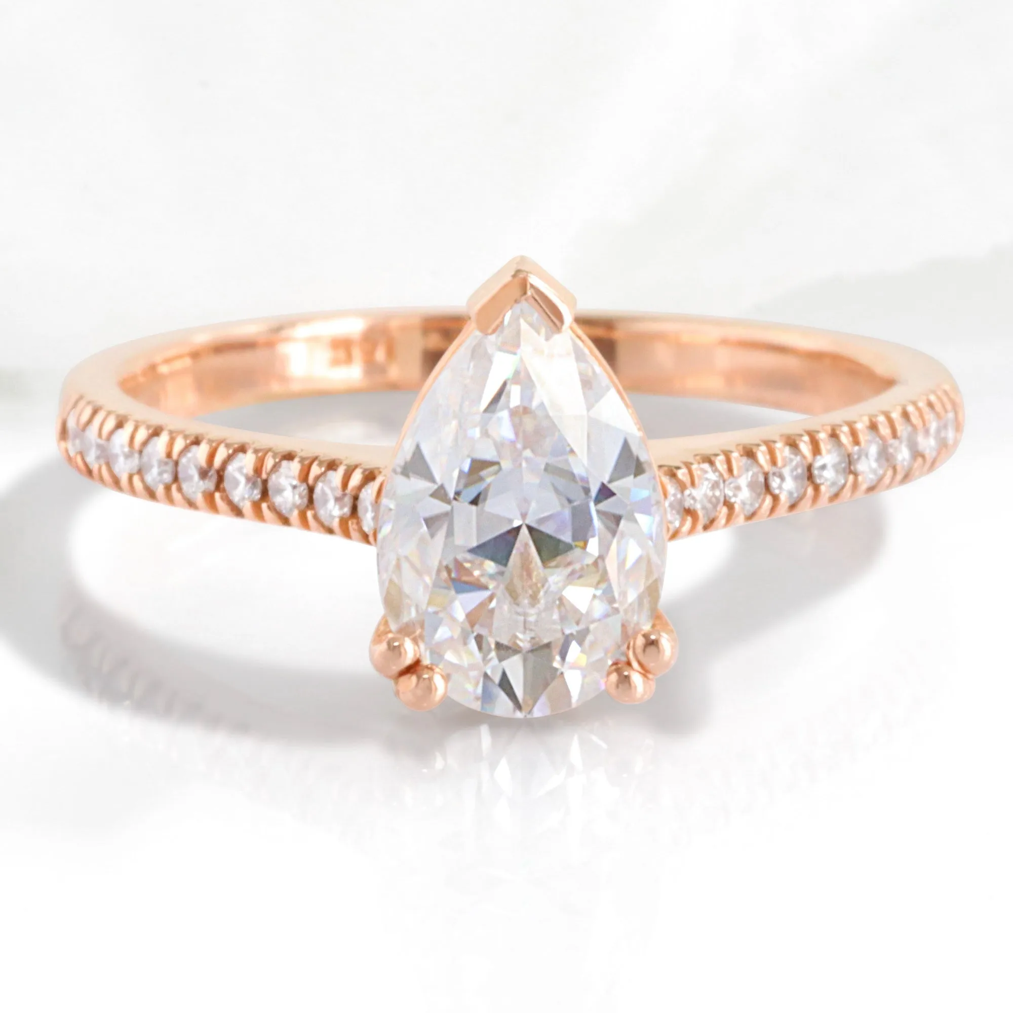 Pear Moissanite Engagement Ring in Grace Solitaire Pave Diamond Band