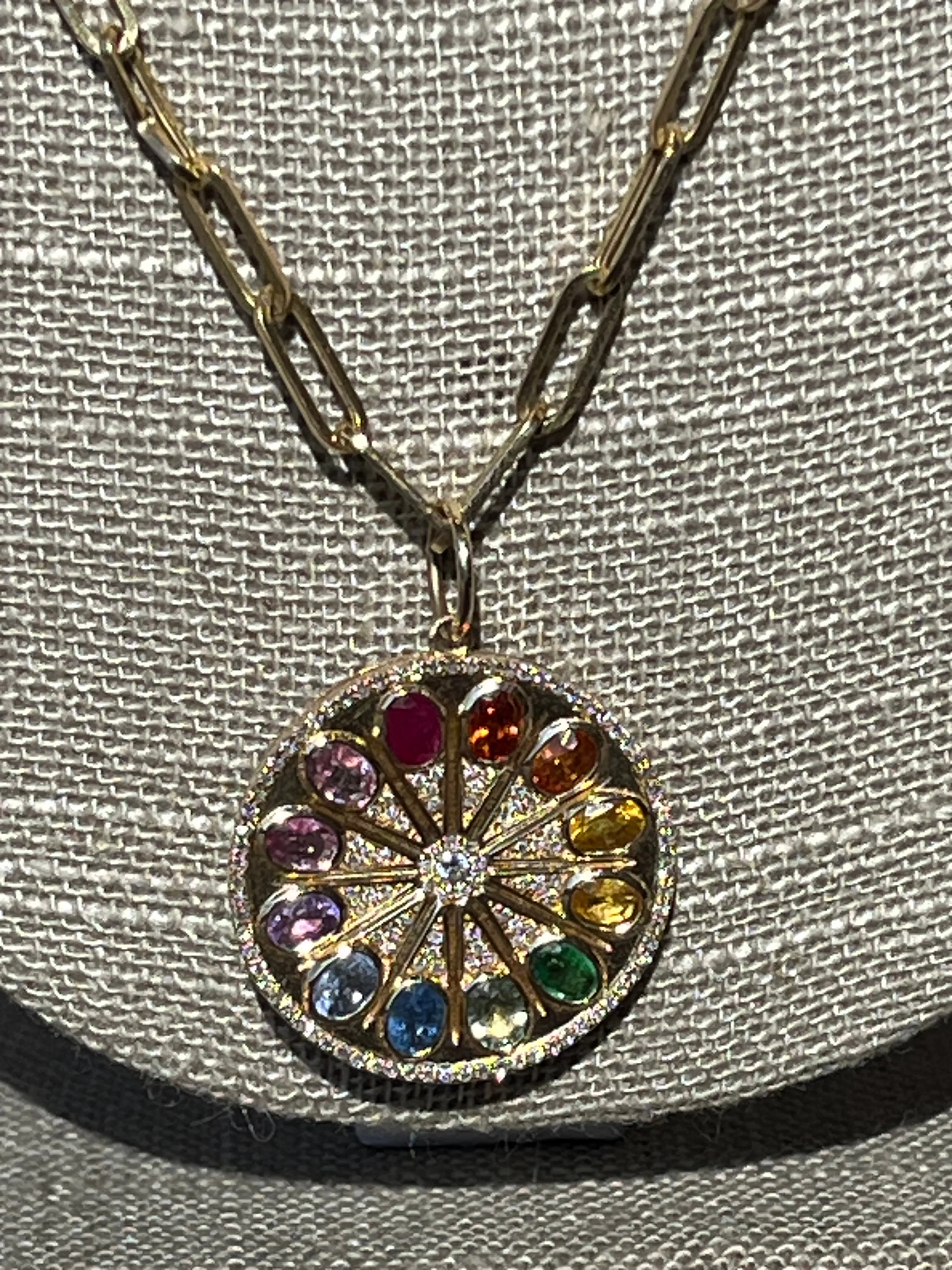 Rainbow sapphire and diamond pendant and on oval 14k chain with lobster clasp