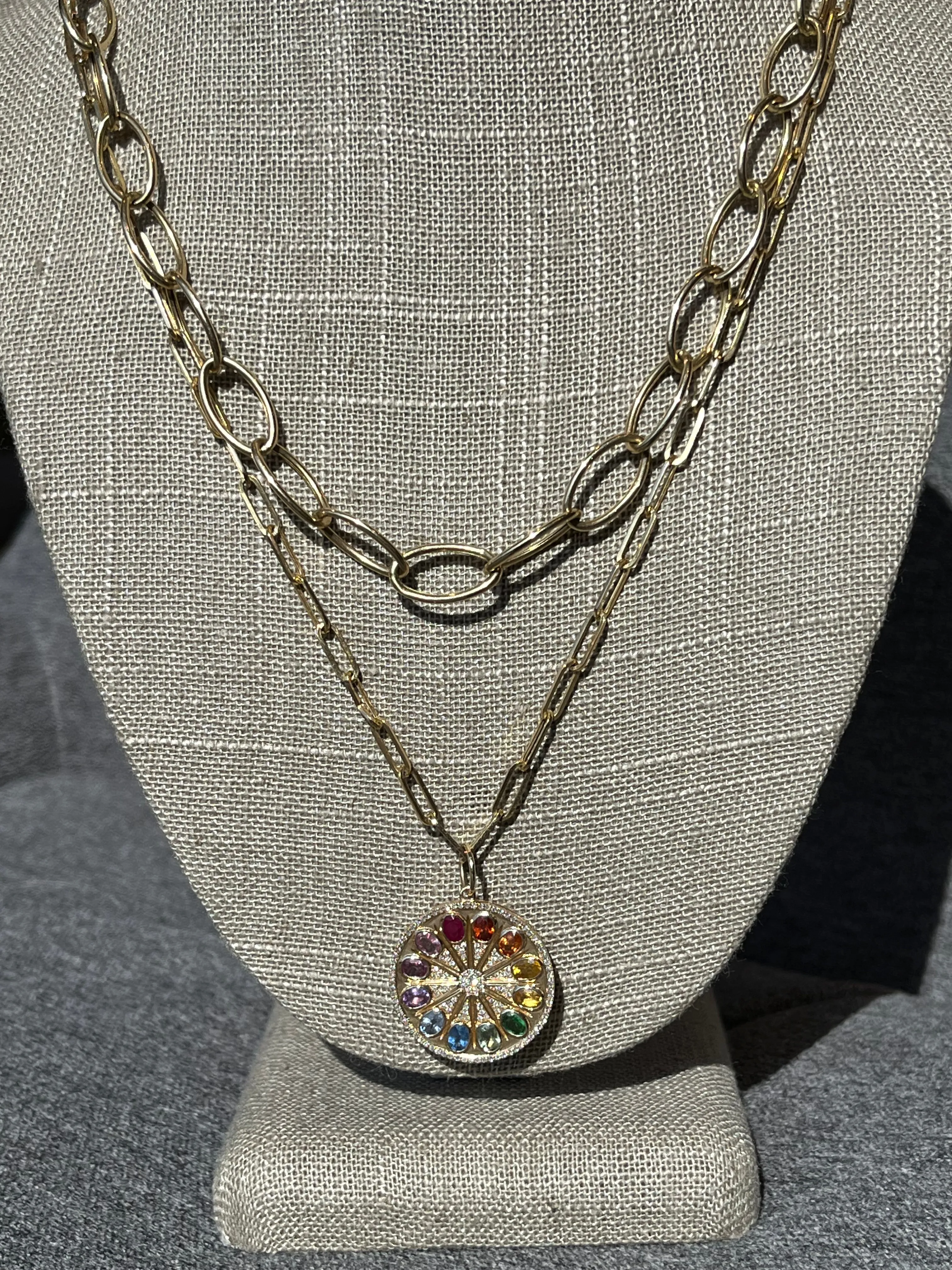 Rainbow sapphire and diamond pendant and on oval 14k chain with lobster clasp