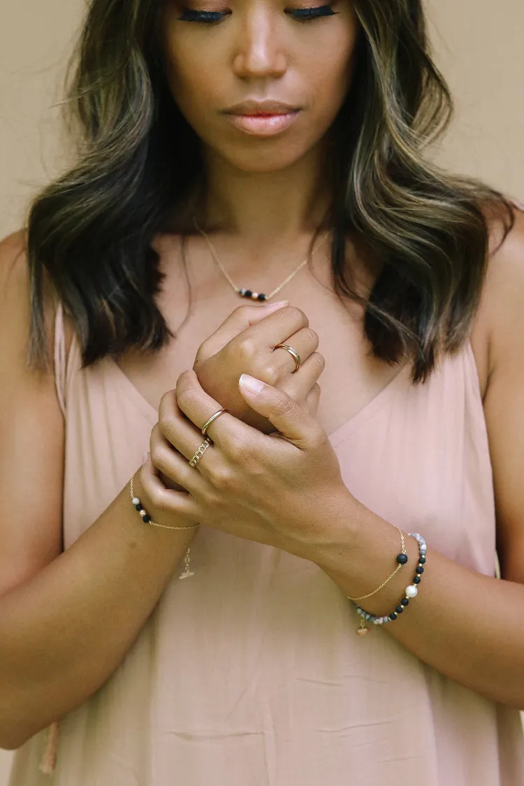 Single Lava Bead Gold Chain Bracelet