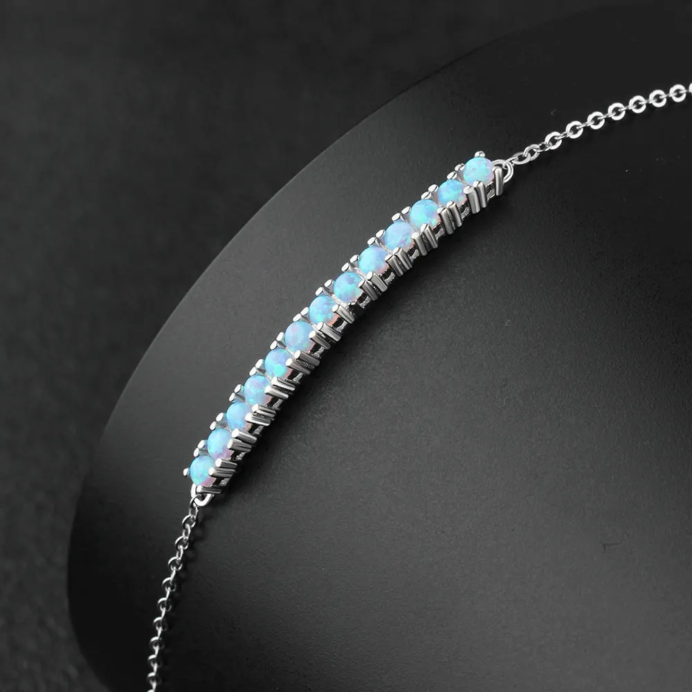 Single Row of Round Blue Opal Sterling Silver Bracelet