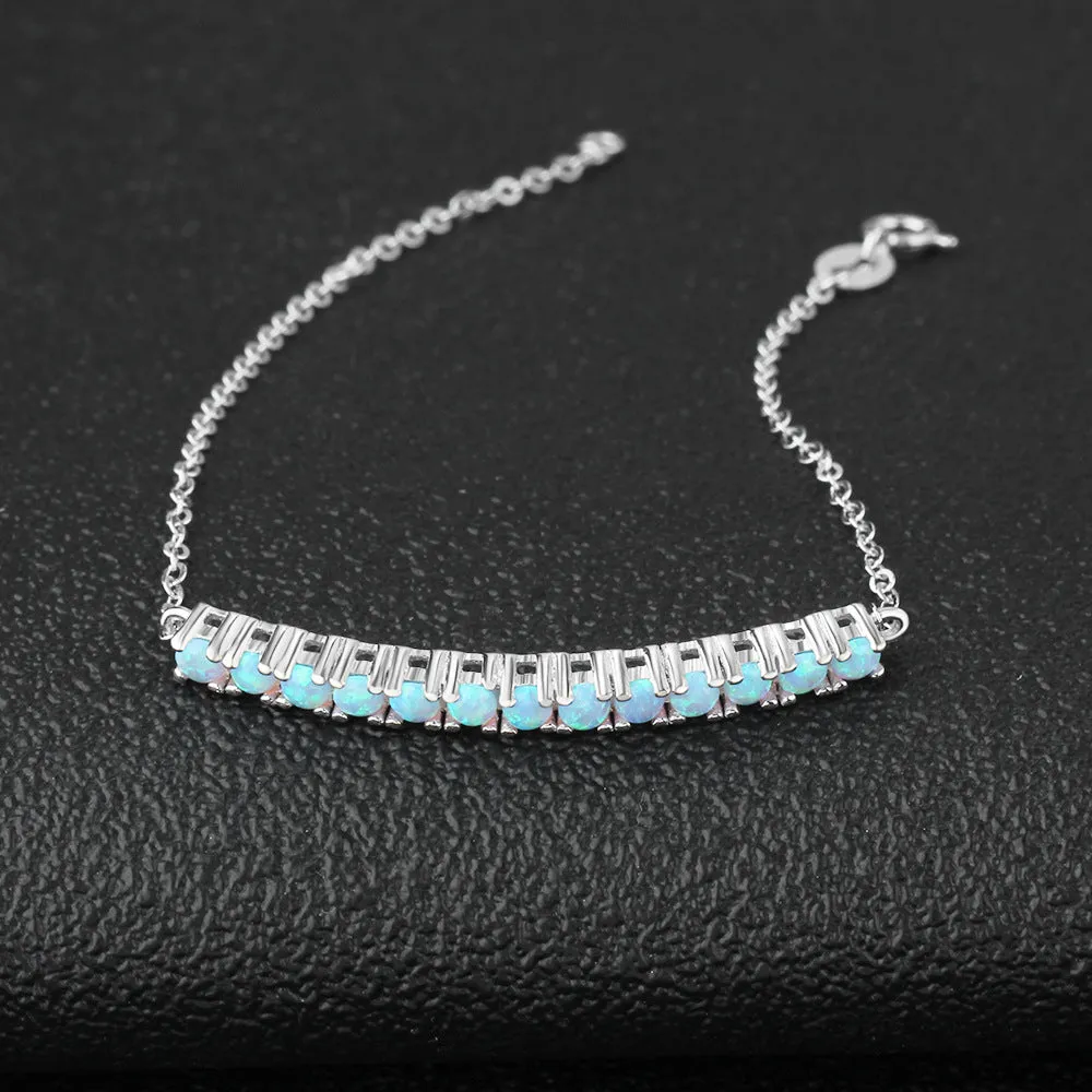 Single Row of Round Blue Opal Sterling Silver Bracelet