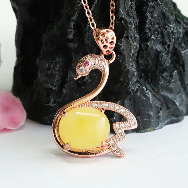 Swan Pendant Crafted from Sterling Silver with Beeswax Amber Gem