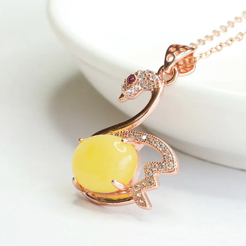 Swan Pendant Crafted from Sterling Silver with Beeswax Amber Gem